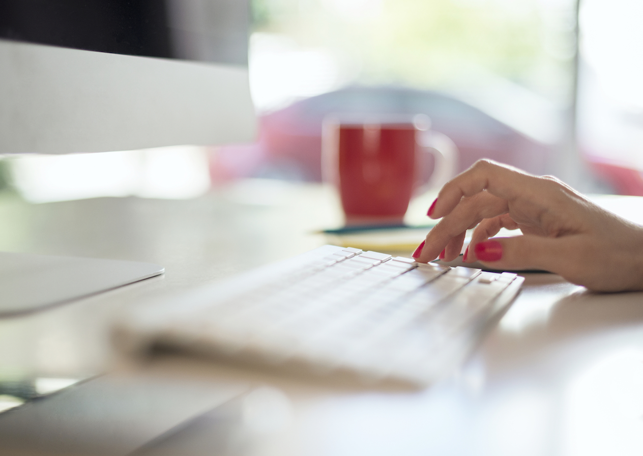 Hands typing, close up